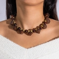 Detailed view of layered necklace with leopard print beads and golden accents on a model - Leopard Square & Wood Bead Style (28353-1-brown)