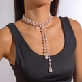 Detail of layered lavender pearl necklace with long tassels and teardrop pendants - Lavender Multi-layer Pearl Tassel Necklace (28831-g)
