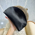 Elegant black suede clutch with a gold rhinestone frame for evening parties - Black