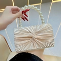 Champagne pleated silk evening bag featuring a white pearl handle for party - Apricot