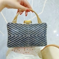 Borsa da sera scintillante con strass geometrici neri e argento e manico dorato - Nero