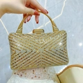 Elegante borsa da sera dorata con strass scintillanti e manico in metallo lucido - Oro