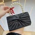 Elegant black pleated evening bag featuring a luxury white pearl top handle for women - Black