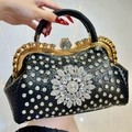 Luxuriöse schwarze Abendtasche mit Strass-Sonnenblume und goldenem Metallgriff - Schwarz