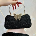 Elegante bolso de noche negro con pedrería, cierre de mariposa dorado y asa de anillo - Negro