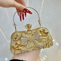 Elegant gold glitter evening clutch bag with sparkling rhinestone bow and round handle - Gold
