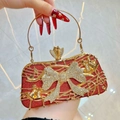 Red sequined evening clutch with golden rhinestones bow and musical note details - Burgundy