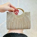 Sparkling gold and clear rhinestone evening clutch with circular metal handle - Gold