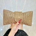 Elegante pochette a fiocco oro champagne con cristalli scintillanti e strass - Champagne