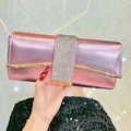 Elegant metallic pink clutch bag with rhinestone band for gala and evening parties - Pink