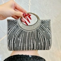 Elegant zebra stripe rhinestone clutch bag with a shimmering crystal circular handle - Black
