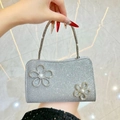 Silver sequin evening clutch bag featuring elegant pearl and rhinestone flower ornaments - Silver