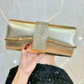 Elegant gold evening clutch bag with sparkling rhinestone band and metal bar accent - Gold