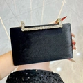 Elegante bolso de noche tipo clutch en terciopelo negro con cierre de pedrería - Negro