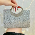 Sparkling silver rhinestone clutch with round crystal handle for formal evening wear - Silver