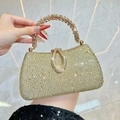 Luxe champagne goudkleurige clutch met fonkelende strassteentjes en metalen handvat - Goud