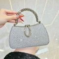 Luxe zilveren clutch met strassteentjes en fonkelende kristallen handvatten - Zilver