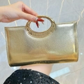 Funkelnde goldene Abend-Clutch mit metallischer Kreuzmaserung und rundem Griff - Gold