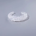 Transparent acrylic open bangle featuring geometric spiral textures and a modern look - Fully Transparent Twisted Pattern (29000-22)