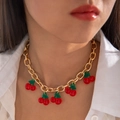Close-up of gold chunky link necklace with translucent red resin cherry pendants - Gold Chain 5-Group Red Cherry (28912-G)