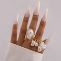Set of two gold baroque irregular pearl rings for women in a stackable fashion style - Baroque Pearl Chain 2-Piece Set (28587-gold)