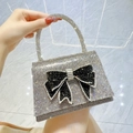 Silver square evening handbag with a sparkling black rhinestone bow and matching handle - Black
