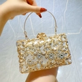 Elegante goldene Abendtasche mit funkelnden Strasssteinen und rundem Metallgriff - Silber