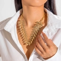 Vintage gold layered leaf statement necklace with thick metal chain on a model - Golden Double Layer Overlapping Leaves Style(28995-G)