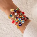 Set di braccialetti bohémien con perline colorate malocchio, cuore dorato e corda rossa - Set di 5 Pezzi Rosso Malocchio Cuore Intrecciato(28536-red【特价】)
