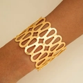 Detailed close-up of wide gold hollow cuff bracelet with geometric lace patterns - Golden Pattern Hollow Style (29723-G)