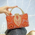 Pochette da sera di lusso con strass rossi, motivi di pietre preziose e manico dorato - Rosso
