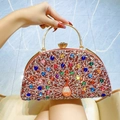 Peacock crystal evening clutch with colorful rhinestones and golden ring handle - Red