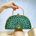 Peacock shaped evening clutch bag with green crystal rhinestones and gold ring handle - Green
