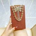 Clutch da sera rossa con farfalla di strass e elegante tracolla a catena dorata - Rosso