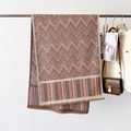 Thick knit scarf with brown and orange wavy patterns and delicate fringe trim detail - Zigzag Orange Pink