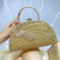 Golden clutch bag with luxury rhinestones and peacock detail for elegant evening wear - Gold