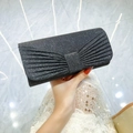 Pochette da sera nera glitterata con fiocco a pieghe per feste ed eventi eleganti - Nero