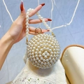 Elegant spherical pearl evening handbag with beaded handle and golden metal clasp - Gold
