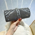 Elegante pochette cilindrica da sera con strass neri e argento e dettaglio con frange - Nero