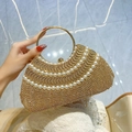 Luxurious gold evening clutch bag with sparkling rhinestones, pearls and round metal handle - Gold