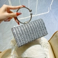 Elegant silver clutch bag with sparkling rhinestones and metal ring handle for parties - Silver