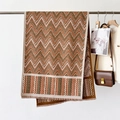Thick autumn-winter chevron scarf with warm orange and brown tones and fringe trim - Zigzag Beige Yellow