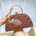 Red rhinestone evening clutch bag with gold peacock ornament and metal handle - Red