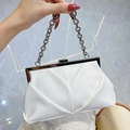 White pleated evening clutch bag with silver chain strap and metallic buckle closure - White