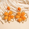 Handmade orange raffia flower earrings with gold metal outlines on beige background - Orange Flower Metal Frame (29364-orange)