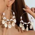 Detail of bohemian shell hoop earrings with white beads and golden metal dangles - White Beaded Big Loop Style (31039-ear-white-EP)