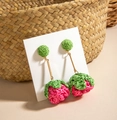 Macro shot of green and fuchsia woven raffia leaf earrings with artisanal textures - Green & Fuchsia Spherical Dangle (29361-colour)