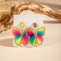 Close-up of rainbow braided butterfly earrings on a gold-plated metal frame - Rainbow Metallic Butterfly (29325-colour)