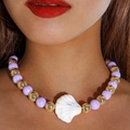 Detail of beaded beach necklace featuring purple pearls and white shell pendant - Pale Purple (29452-purple)
