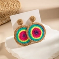 Detailed macro shot of handmade raffia woven earrings with rainbow spiral texture - Rainbow Spiral Circle (29323-colour)
